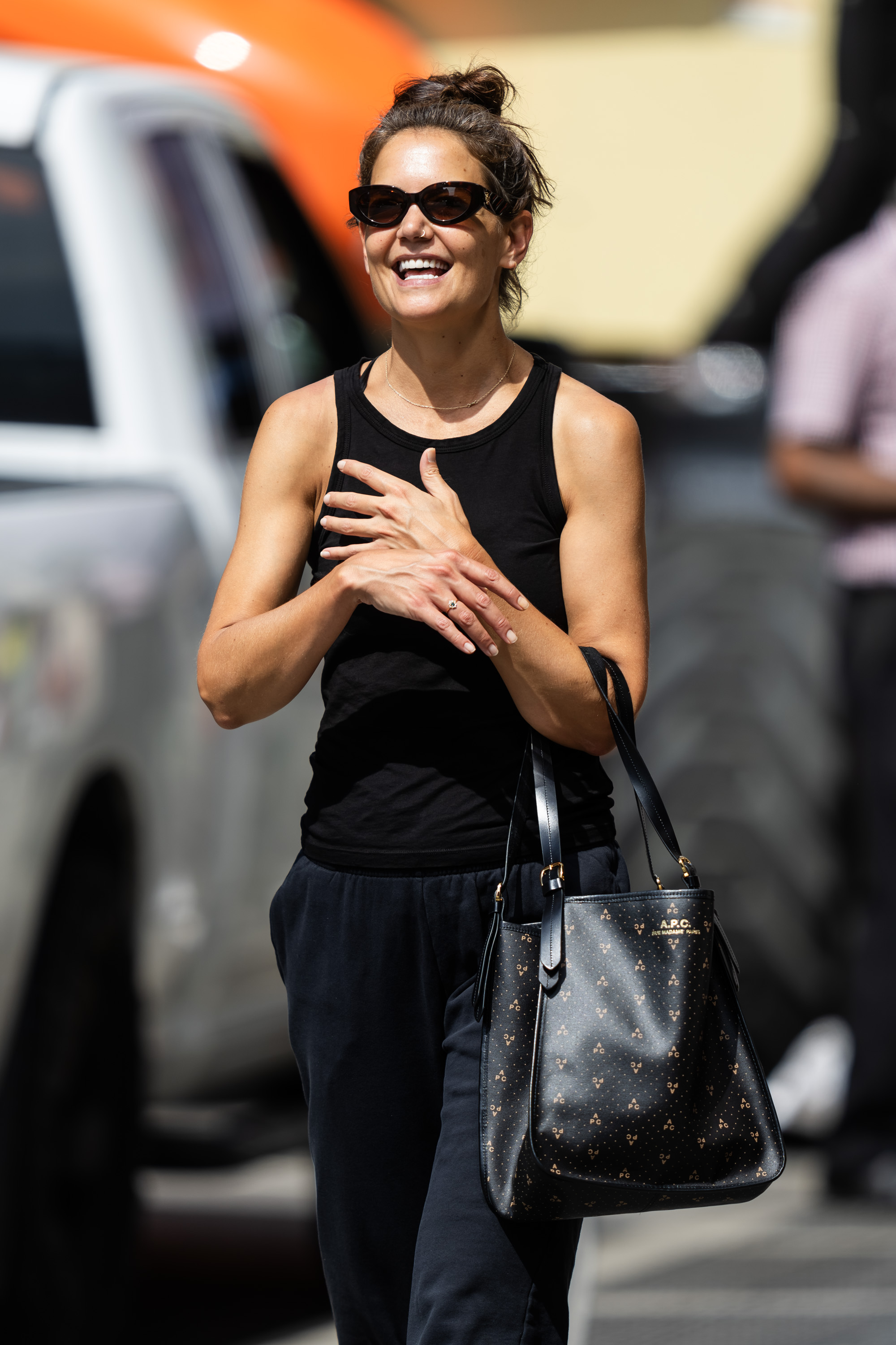 Katie Holmes smiles while walking in NoHo, New York City on August 14, 2023. | Source: Getty Images