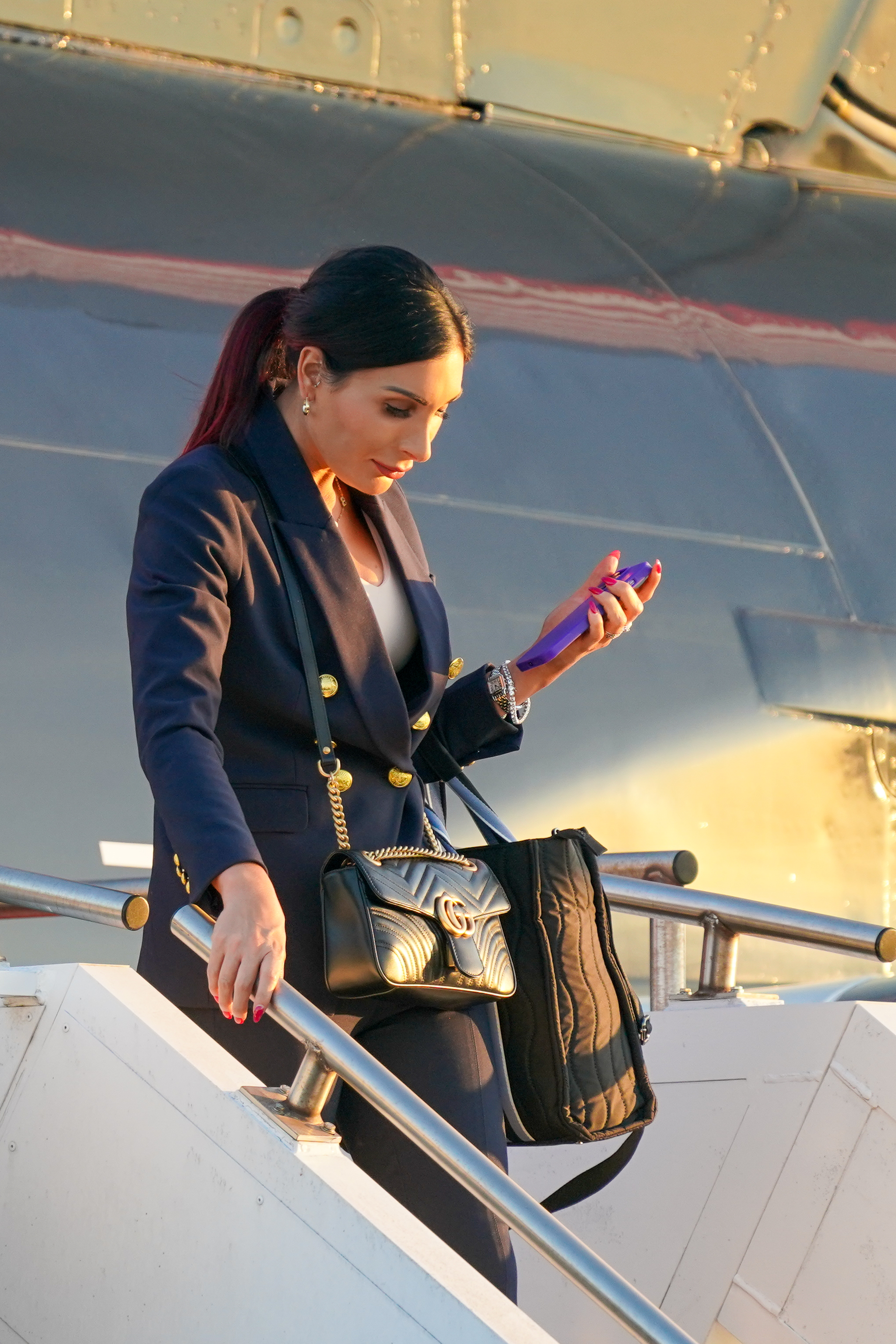 Laura Loomer arrives at Philadelphia International Airport on The Trump Organization's Boeing 757 ahead of The ABC News Presidential Debate on September 10, 2024 | Source: Getty Images