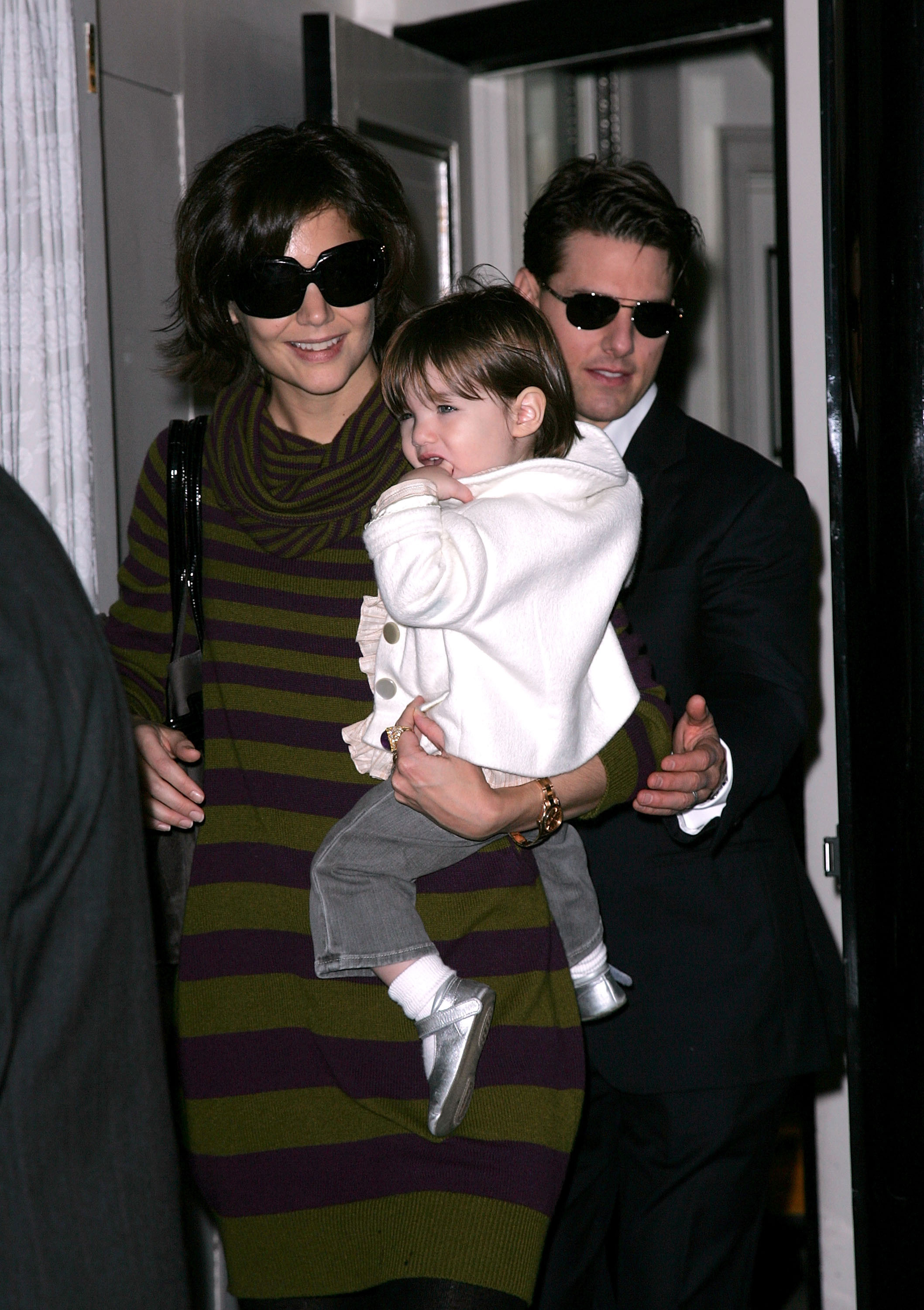 Katie Holmes and Tom Cruise with their daughter Suri Cruise in New York City on October 19, 2007. | Source: Getty Images