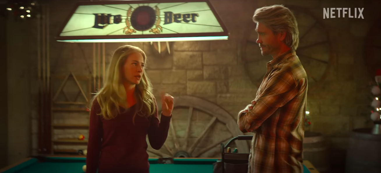 Brittany Robertson as Ashley and Chad Michael Murray as Luke in the trailer of "The Merry Gentlemen," posted on October 24, 2024 | Source: YouTube/Netflix