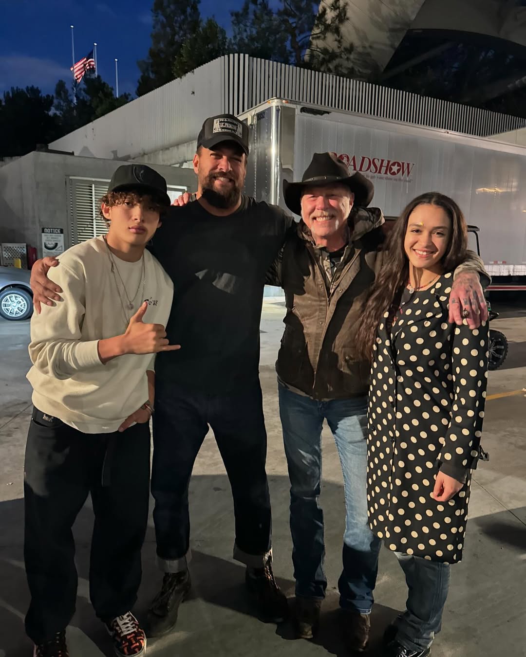 Nakoa-Wolf, Jason Momoa, a band member, and Lola from a post dated December 14, 2024 | Source: Instagram/prideofgypsies