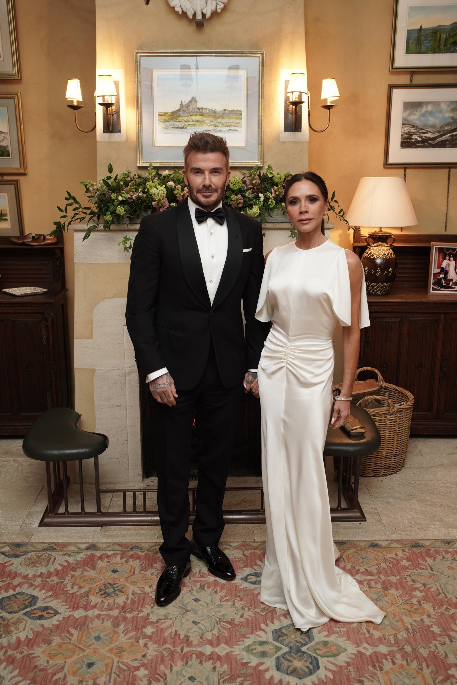 David Beckham and Victoria Beckham attend a dinner in celebration of Slow Food at King Charles III's Gloucestershire estate, Highgrove Gardens in Tetbury, England, on February 7, 2025 | Source: Getty Images