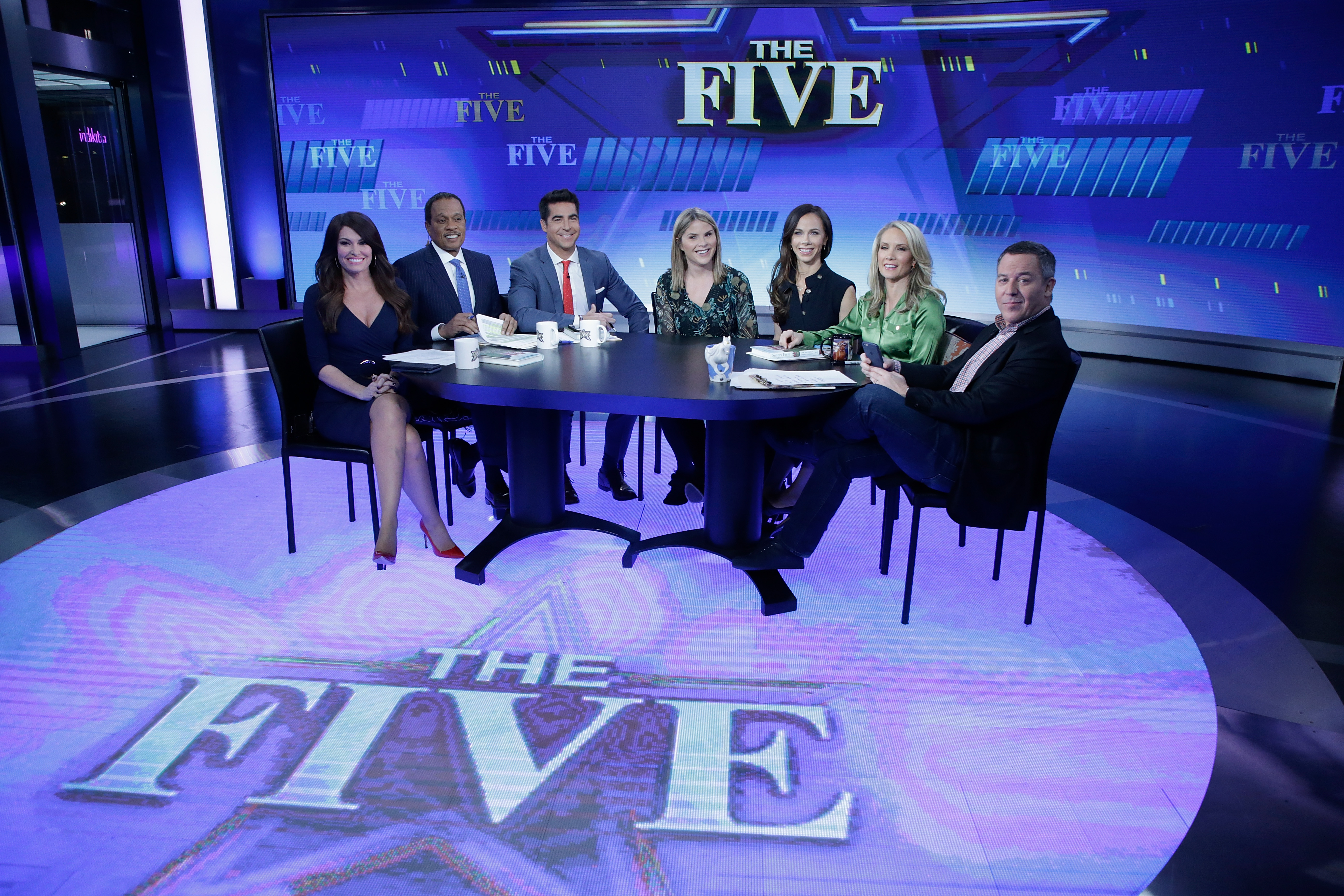 Jenna Bush Hager and Barbara Bush (C) join the hosts of the "The Five", Kimberly Guilfoyle, Juan Williams, Jesse Watters, Dana Perino and Greg Gutfeld at Fox News Studios on November 13, 2017, in New York City | Source: Getty Images