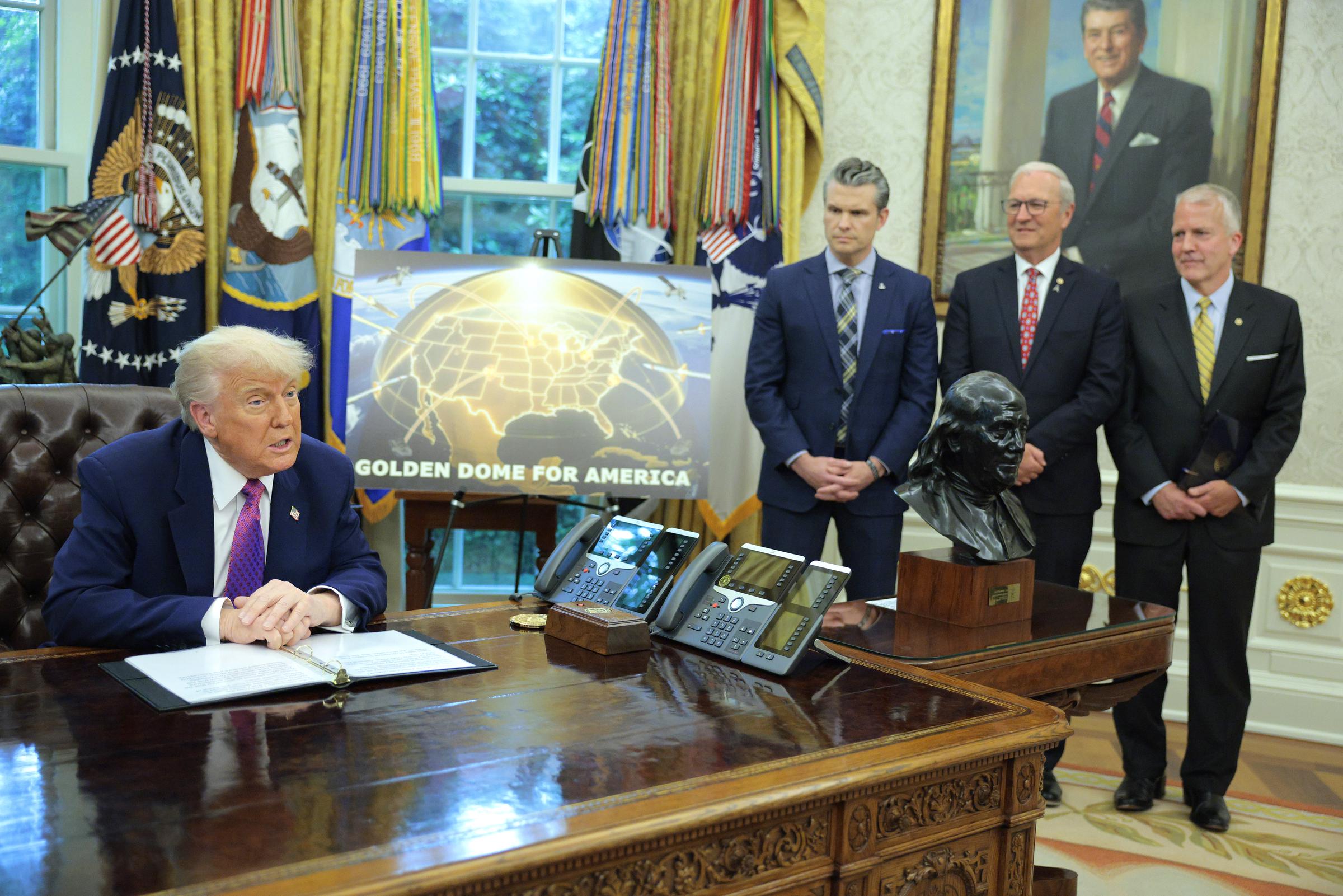 President Donald Trump speaks alongside Secretary of Defense Pete Hegseth, Sen. Kevin Cramer (R-ND), and Sen. Dan Sullivan (R-AK) in the Oval Office of the White House on May 20, 2025 | Source: Getty Images