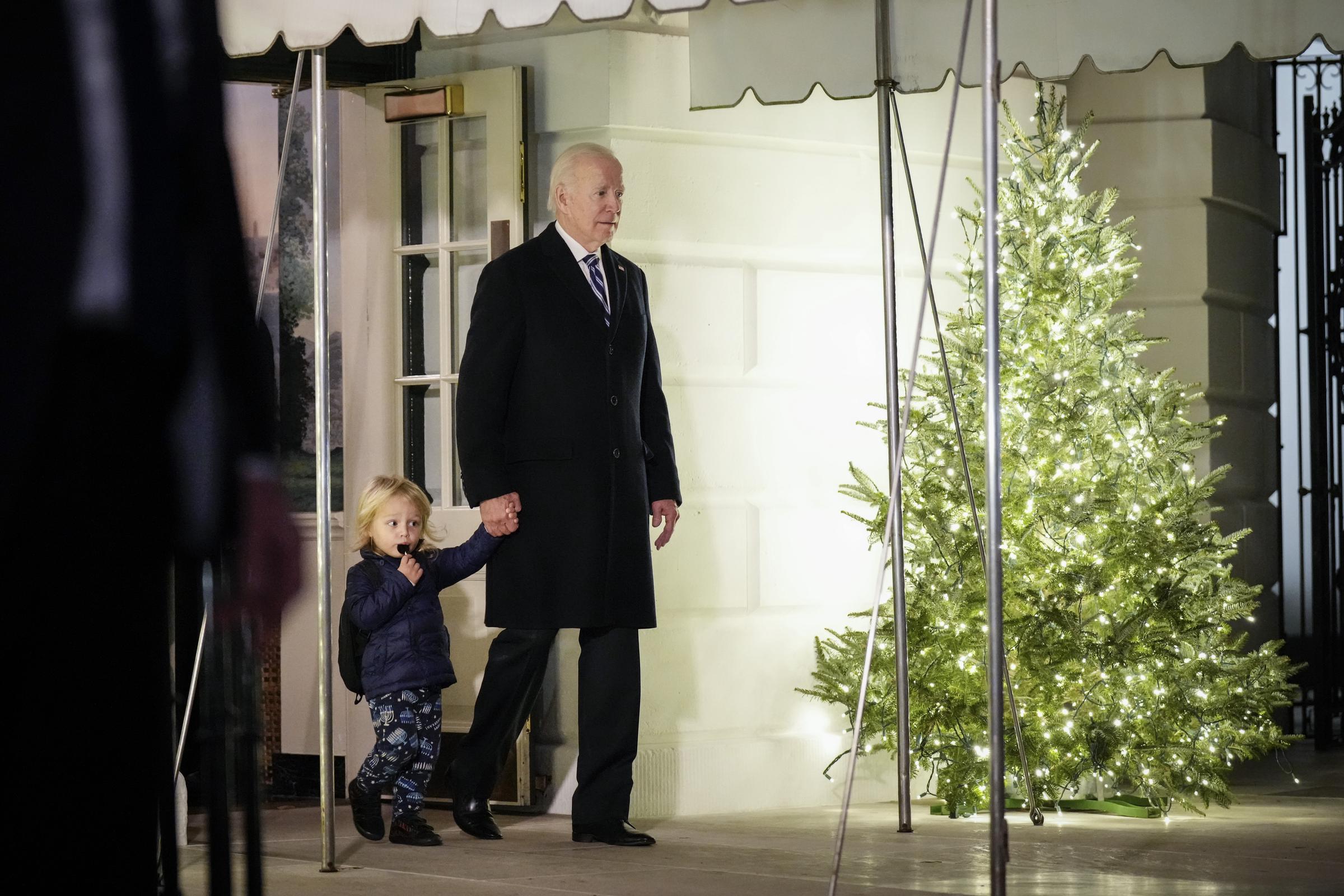 US President Joe Biden walks with Beau Biden Jr. as they head to Marine One on the South Lawn December 16, 2022, in Washington, D.C. | Source: Getty Images