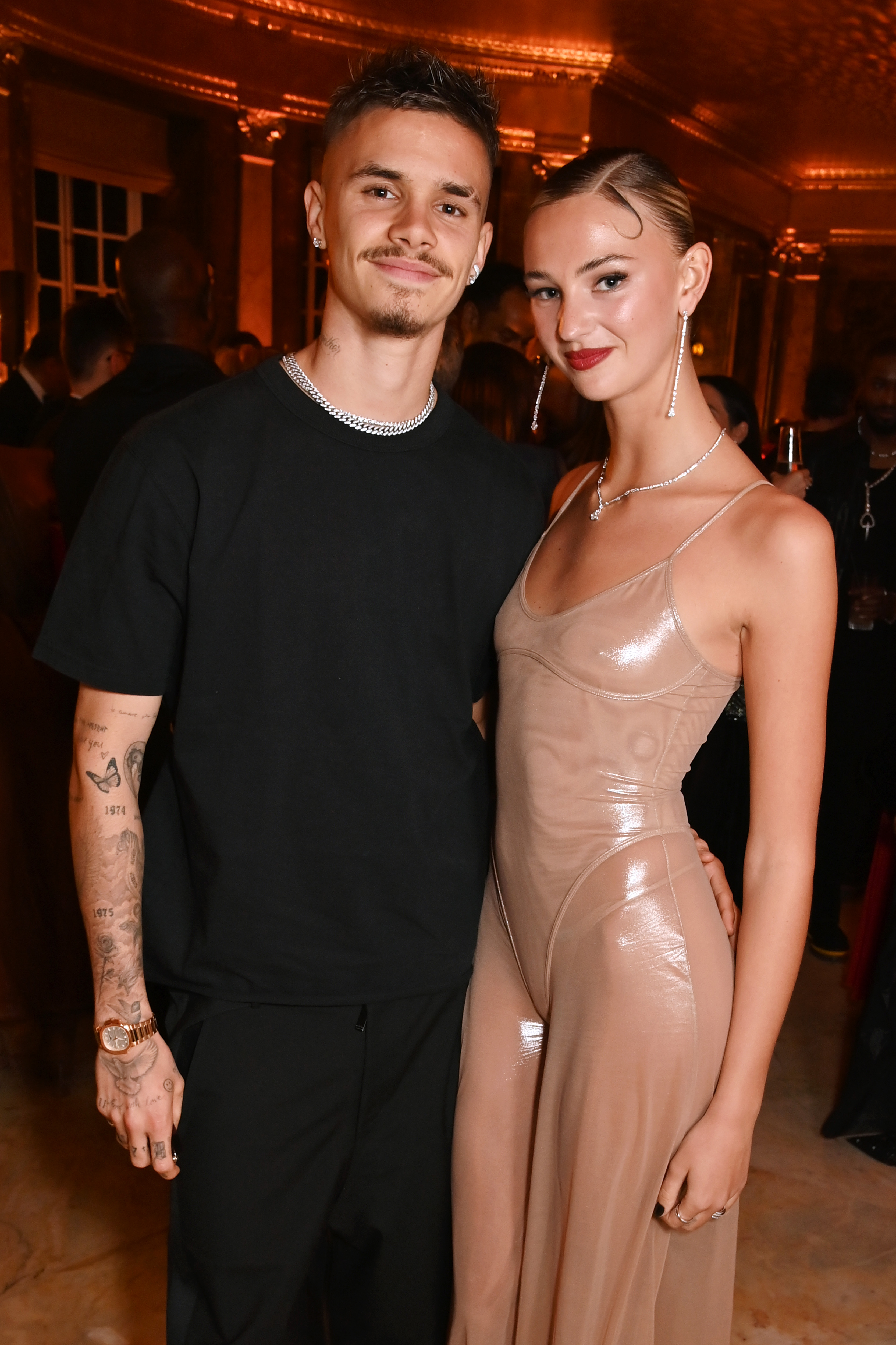 Romeo Beckham and Mia Regan attend a star-studded event honoring Edward Enninful's Trailblazer Award, hosted by Natasha Poonawalla, on December 4, 2023, in London. | Source: Getty Images