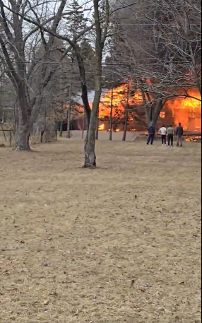 A scene showcasing a fire breakout from the house where the plane crashed in Minnesota posted on March 29, 2025 | Source: X/FrankieMcLister