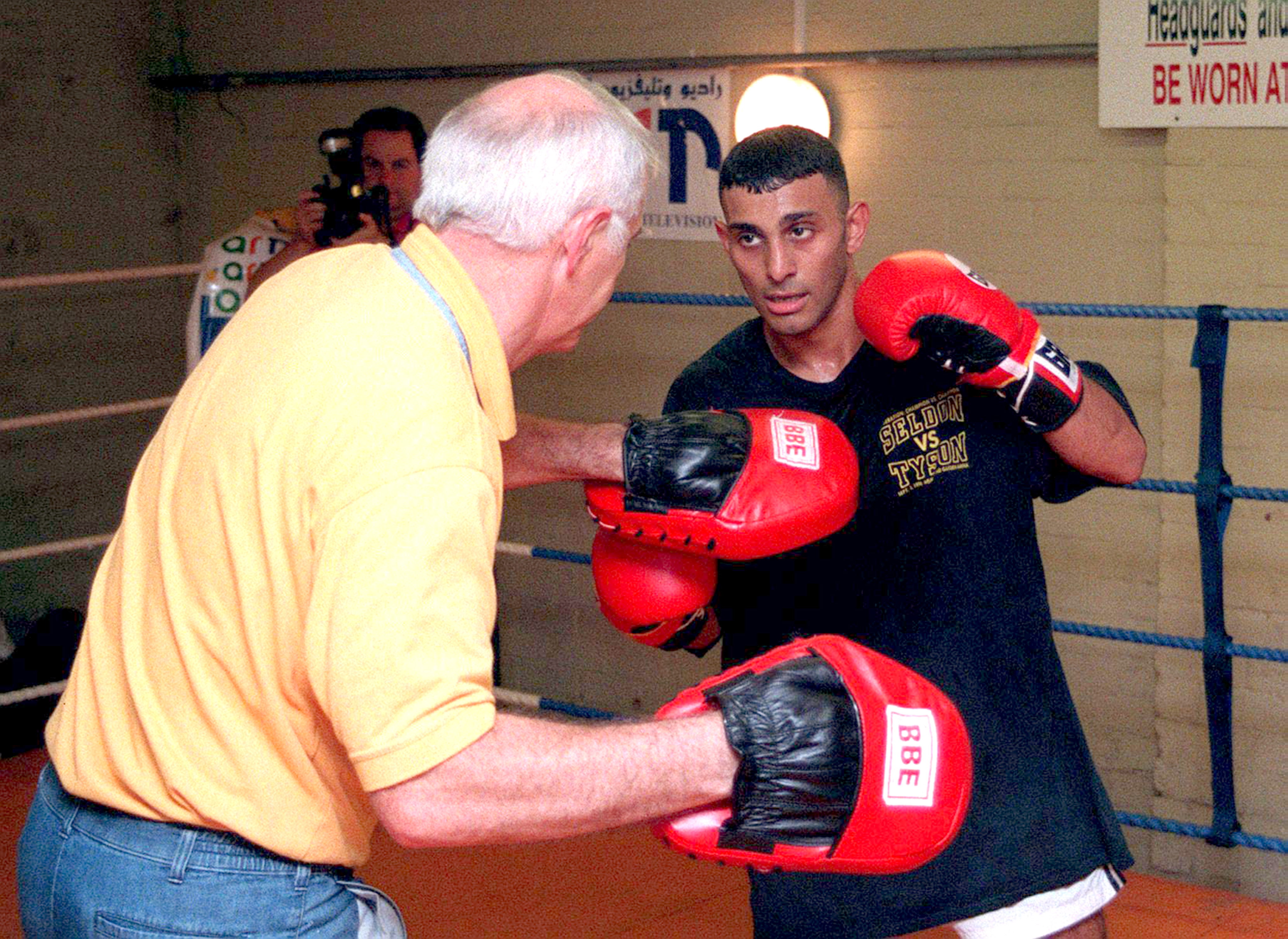 Prince Naseem Hamed with his trainer Brendan Ingle training for the WBO featherweight title in Sheffield, England in 1997. | Source: Getty Images