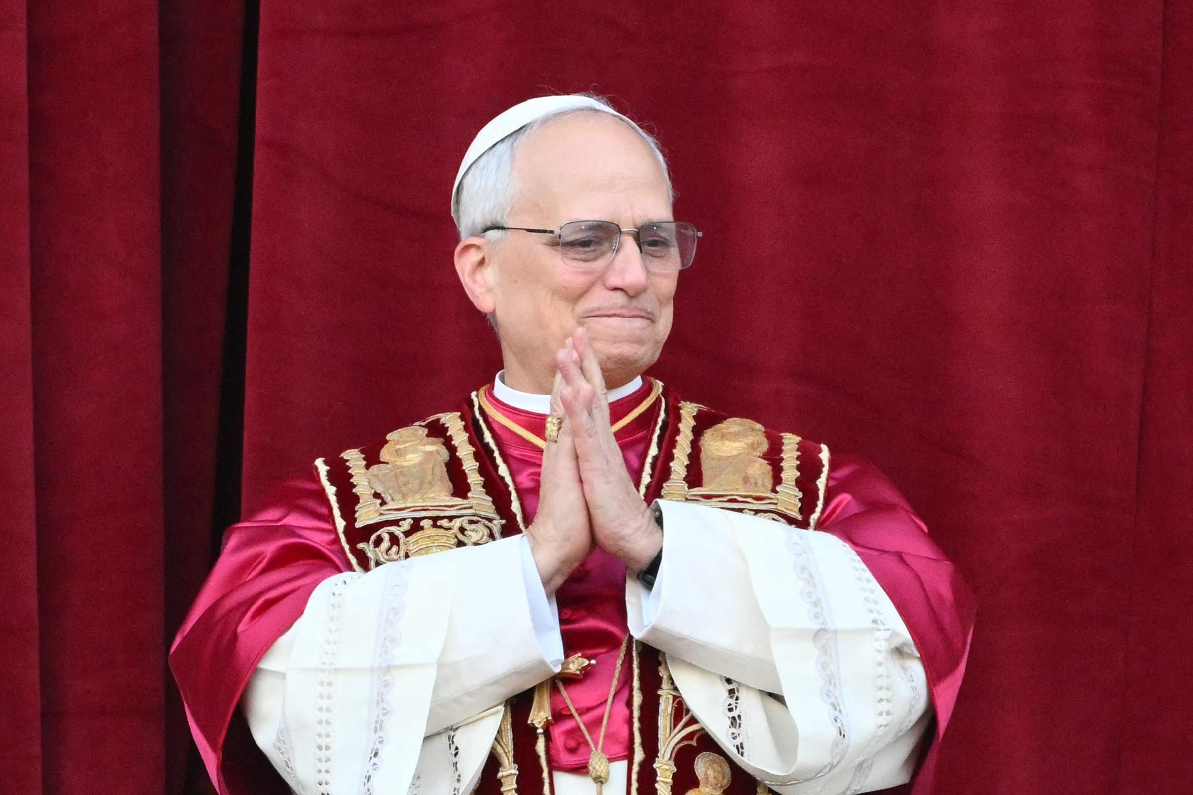Pope Leo XIV is seen on the Saint Peter's Basilica balcony, at Saint Peter's Square in Vatican on April 8, 2025 | Source: Getty Images