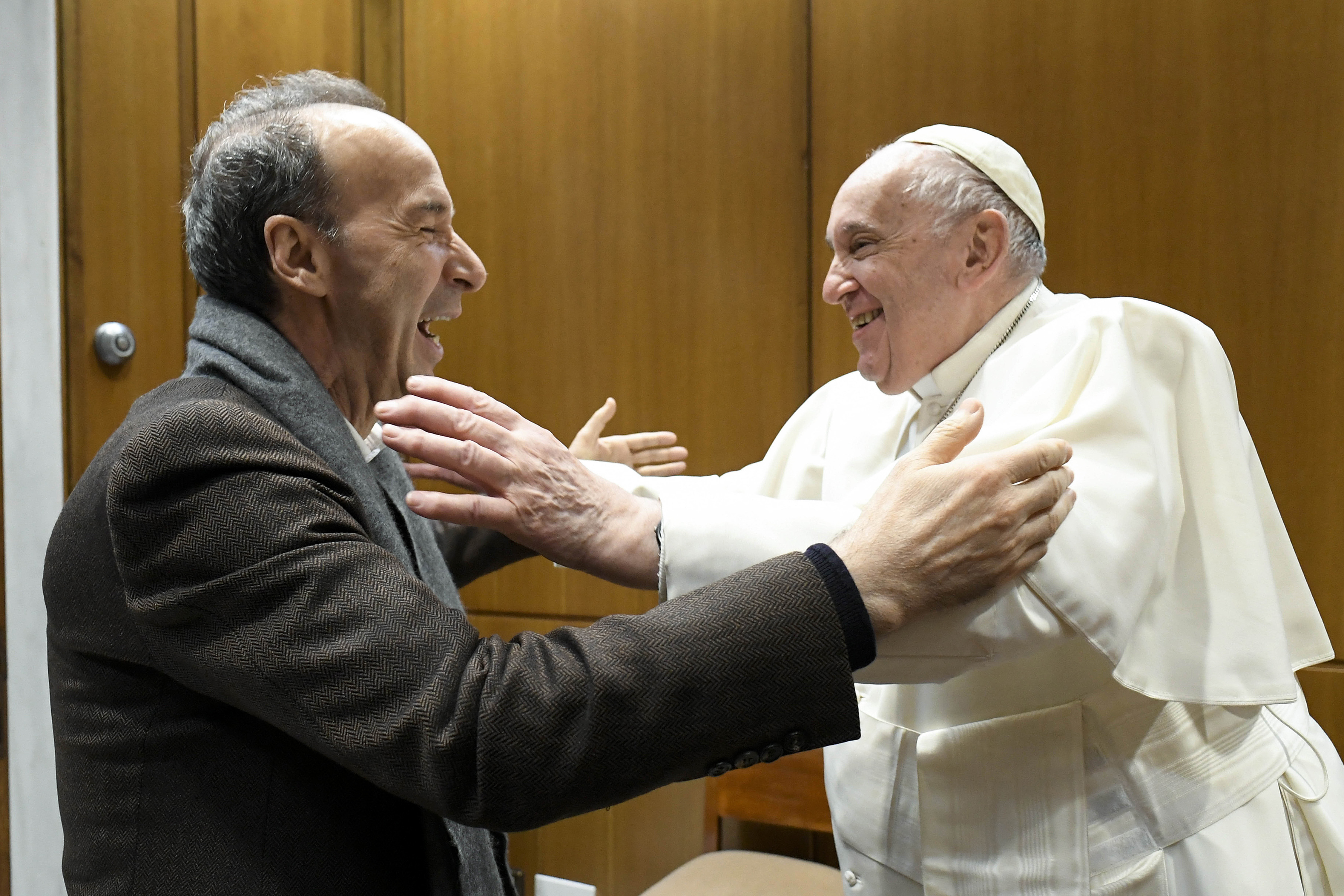 Pope Francis meeting Italian actor and director Roberto Benigni at Paul VI Hall in Vatican City, on December 7, 2022 | Source: Getty Images