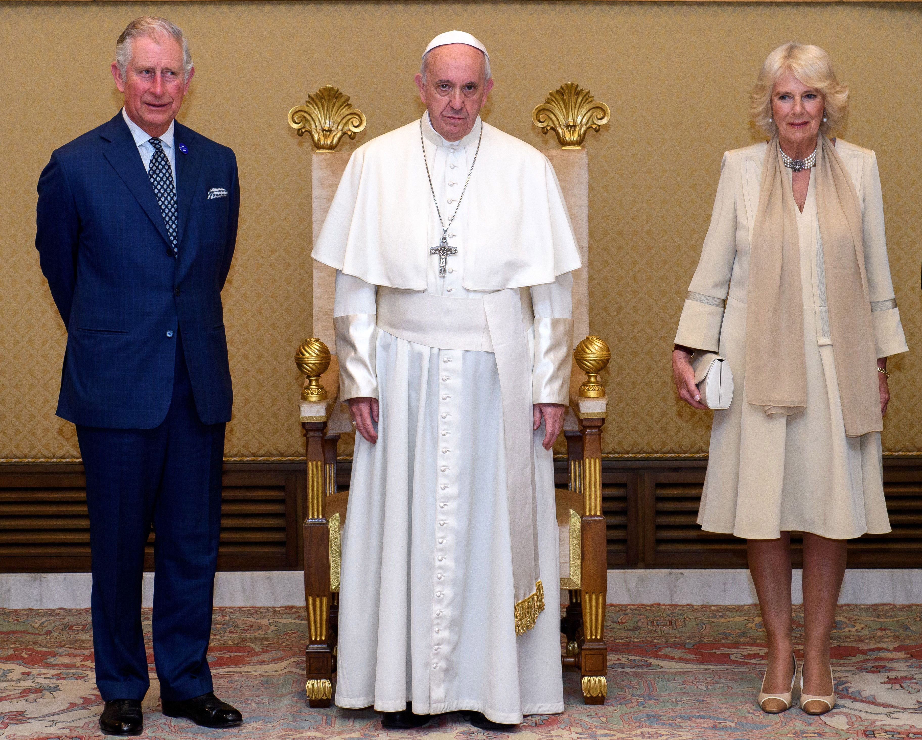 Pope Francis poses with Prince Charles and Camilla, Duchess of Cornwall, during the royal couple's visit to the Vatican on April 4, 2017, in Vatican City | Source: Getty Images