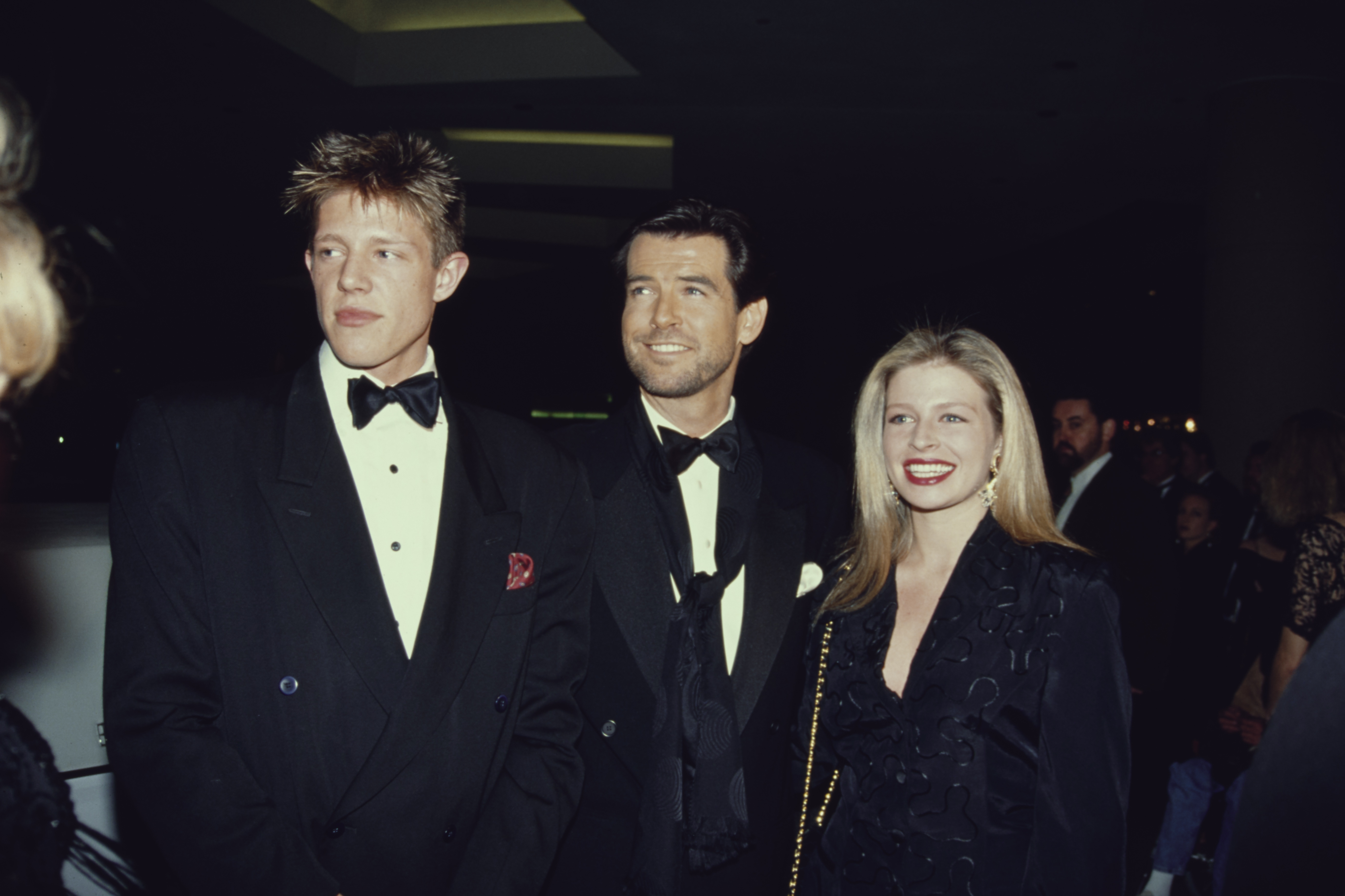 Christopher Harris, Pierce, and Charlotte Harris Brosnan attend the 49th Annual Golden Globe Awards, held at the Beverly Hilton Hotel in Beverly Hills, California, on January 18, 1992 | Source: Getty Images