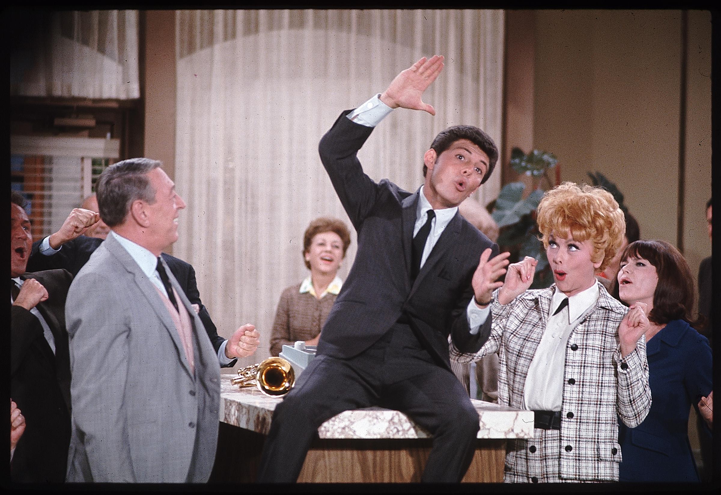 Lucille Ball with guest stars Frankie Avalon and Lew Parker in a scene from "The Lucy Show" | Source: Getty Images