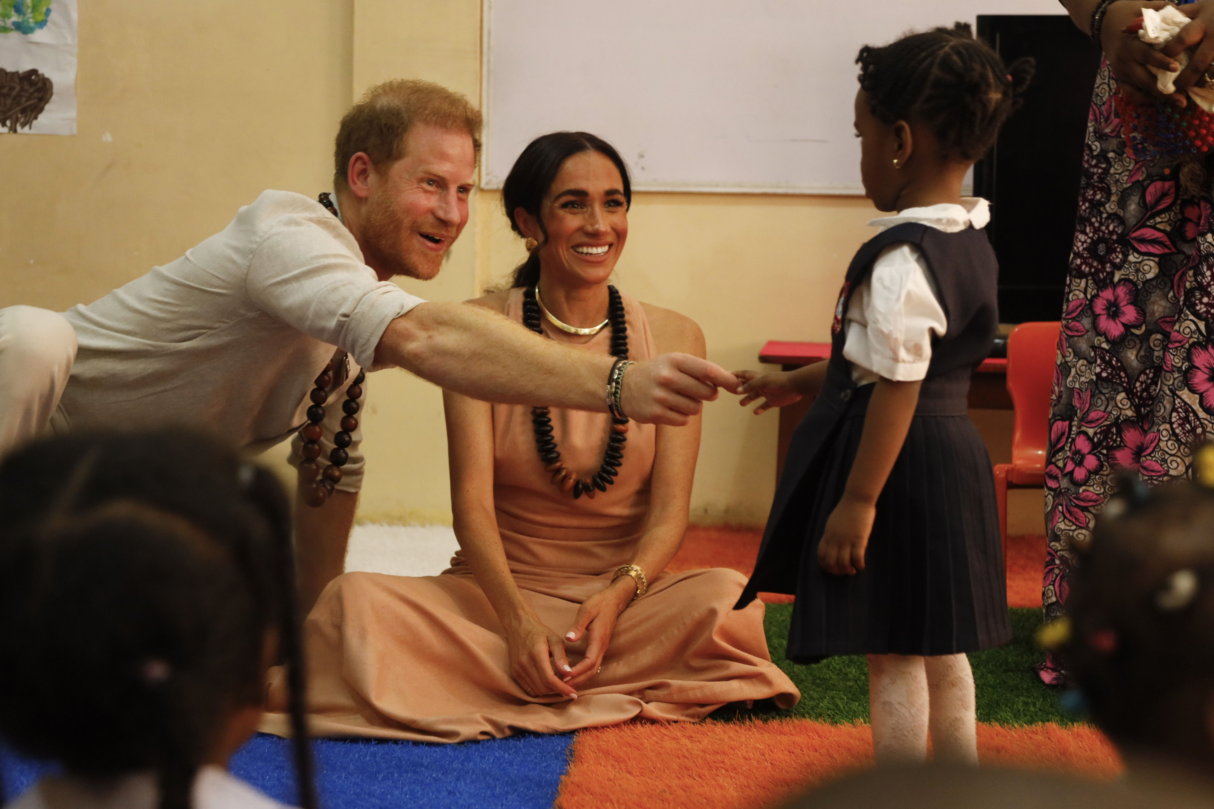 Prince Harry and Meghan, Duchess of Sussex in Abuja, Nigeria in 2024 | Source: Getty Images