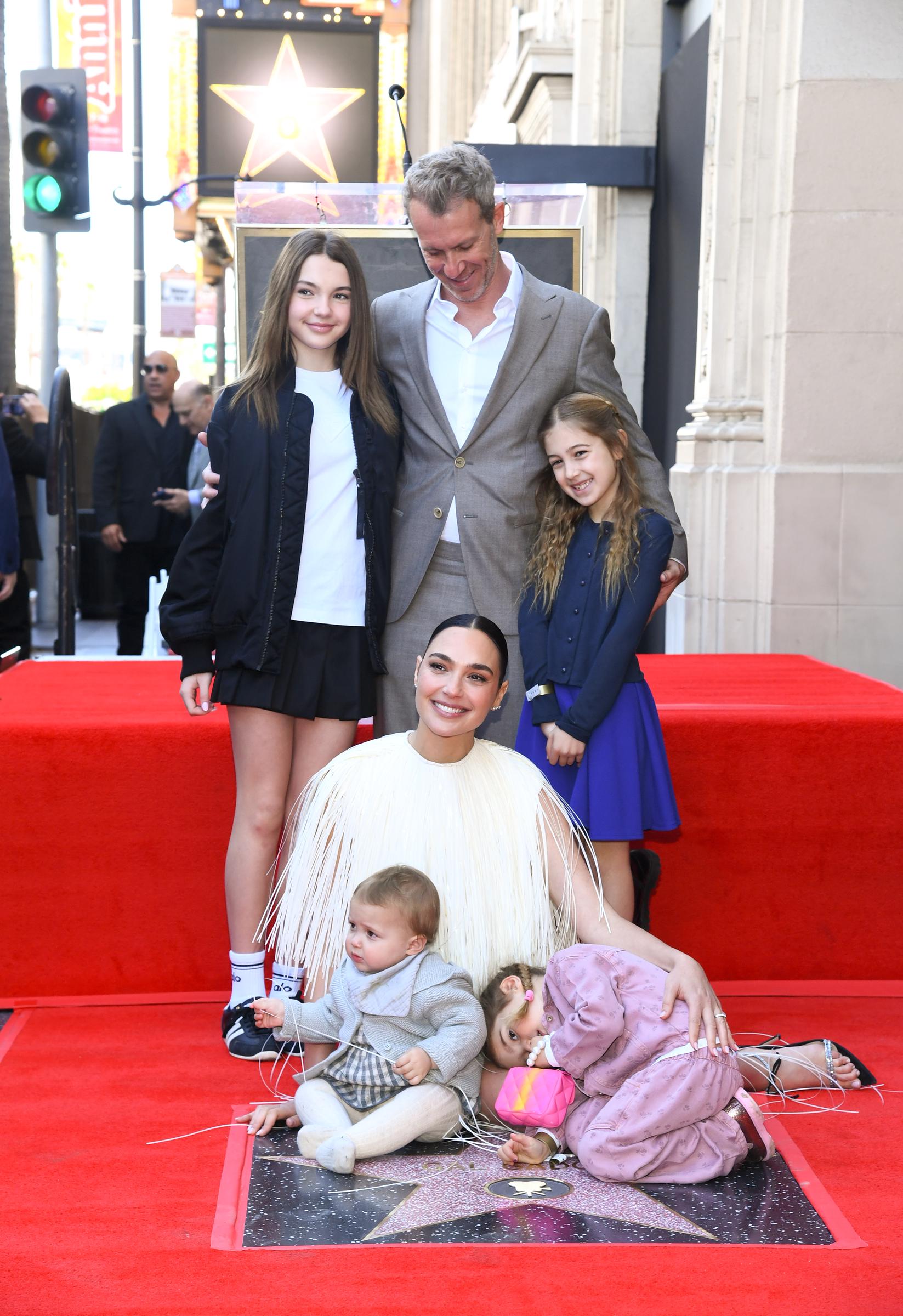 Alma, Jaron, Ori, Maya, and Daniella Varsano are photographed alongside Gal Gadot at the ceremony honoring her with a Star on the Hollywood Walk of Fame on March 18, 2025, in Hollywood, California | Source: Getty Images