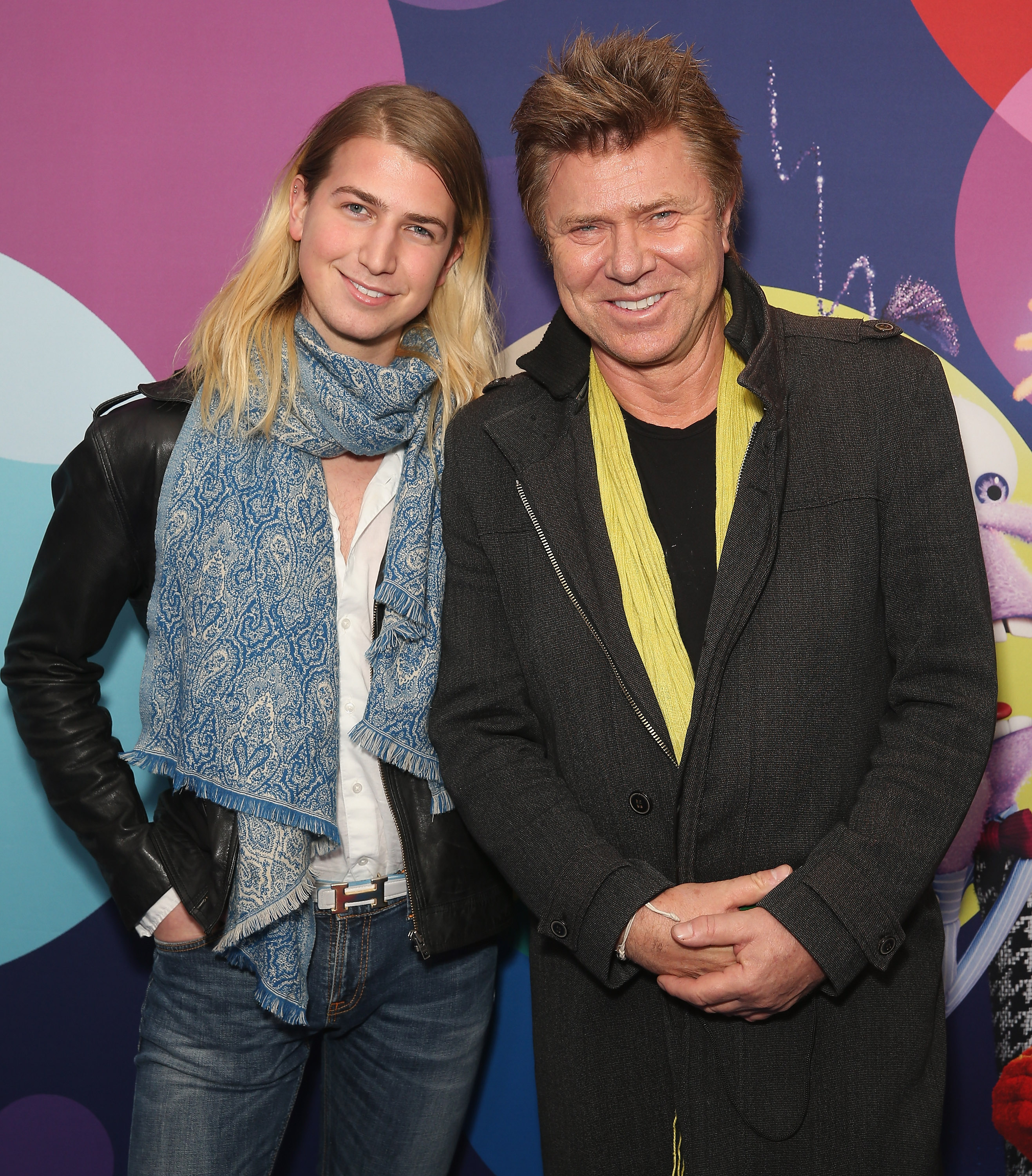 Christian Wilkins and his famous dad at the Australian premiere of "Inside Out" at Event Cinemas George Street on June 15, 2015, in Sydney. | Source: Getty Images