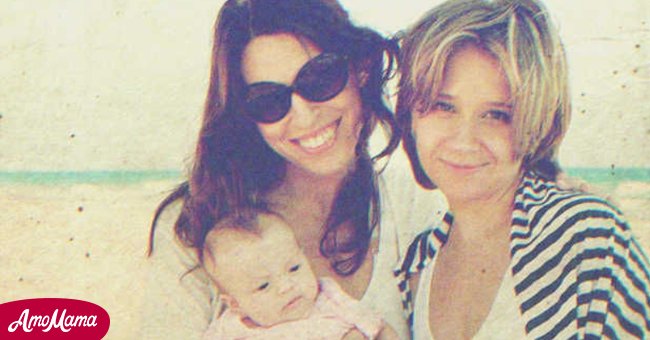 Two women with a baby | Source: Shutterstock